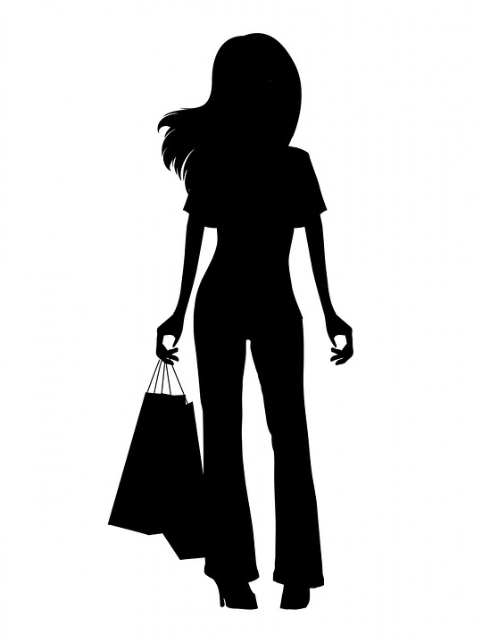 Illustration - silhouette of a woman with shopping bags
